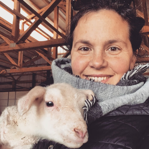 Headshot photo of Jessica Gigot holding lamb